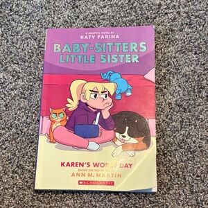 Scholastic Graphic Novel with Pink and Purple Cover